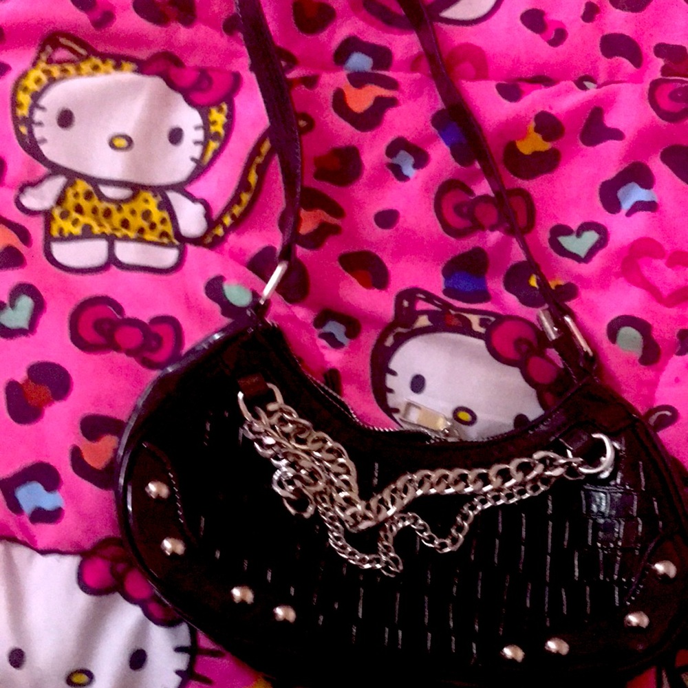 Black skin purse with silver chains